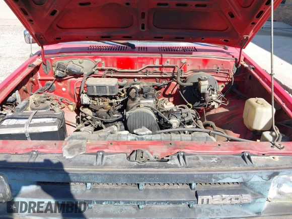 1991 Mazda B-Series Truck with VIN JM2UF3130M0121445, listed as a IAAI auction lot 41646079 with 271,494 mi miles and . Bid and sale history available at DreamBid. Image 10.