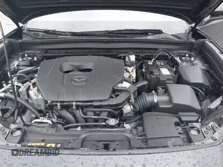 2025 Mazda CX-30 S Carbon Edition z VIN 3MVDMBCM9SM783429, wystawiony jako IAAI lot #42065729 z przebiegiem 4 940 mil mil oraz . Historia ofert i sprzedaży dostępna na DreamBid. Obrazek 10.