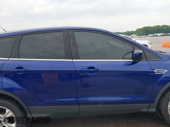 2016 Ford Escape SE z VIN 1FMCU0GX3GUC82461, wystawiony jako IAAI lot #42259207 z przebiegiem 138 939 mil mil oraz . Historia ofert i sprzedaży dostępna na DreamBid. Obrazek 13.