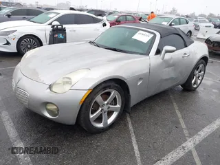 2006 Pontiac Solstice with VIN 1G2MB33B46Y106332, listed as a IAAI auction lot 41561521 with 165,224 mi miles. Bid and sale history available at carsss.com. Image 2.