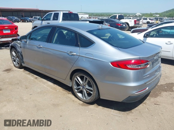 2020 Ford Fusion SEL with VIN 3FA6P0CDXLR196124, listed as a IAAI auction lot 42244231 with 99,306 mi miles and . Bid and sale history available at DreamBid. Image 3.