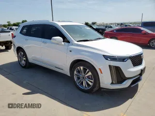 2024 Cadillac XT6 FWD Premium Luxury with VIN 1GYKPCRS7RZ711983, listed as a Copart auction lot 64842625 with 6,394 mi miles and Clean title. Bid and sale history available at DreamBid. Image 4.