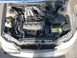 2001 Toyota Avalon XL z VIN 4T1BF28B31U185174, wystawiony jako IAAI lot #42338204 z przebiegiem 298 540 mil mil oraz . Historia ofert i sprzedaży dostępna na DreamBid. Obrazek 10.