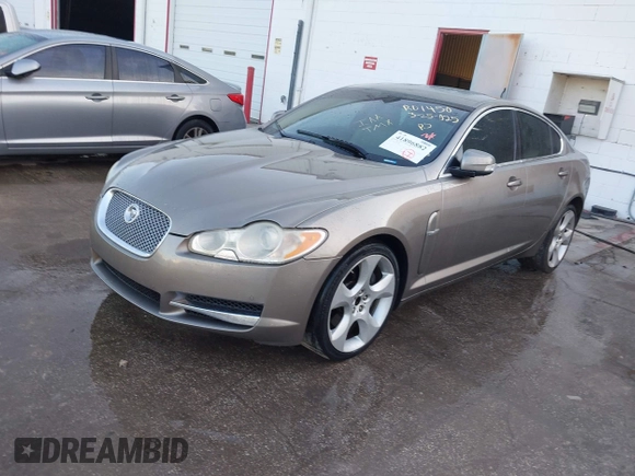 2009 Jaguar XF with VIN SAJWA07C991R01450, listed as a IAAI auction lot 41896882 with 163,857 mi miles and . Bid and sale history available at DreamBid. Image 2.