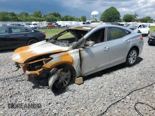 2013 Hyundai Azera z VIN KMHFG4JG2DA281755, wystawiony jako Copart lot #61547995 z przebiegiem Nie podano mil oraz Szkoda całkowita • Salvage title. Historia ofert i sprzedaży dostępna na DreamBid. Obrazek 1.