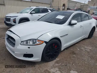 2014 Jaguar XJ R with VIN SAJWA1EK3EMV58692, listed as a IAAI auction lot 42663979 with 111,386 mi miles and . Bid and sale history available at DreamBid. Image 2.