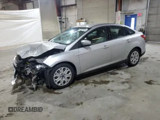 2012 Ford Focus SE z VIN 1FAHP3F21CL463055, wystawiony jako Copart lot #63201335 z przebiegiem 109 696 mil mil oraz Szkoda całkowita • Salvage title. Historia ofert i sprzedaży dostępna na DreamBid. Obrazek 1.