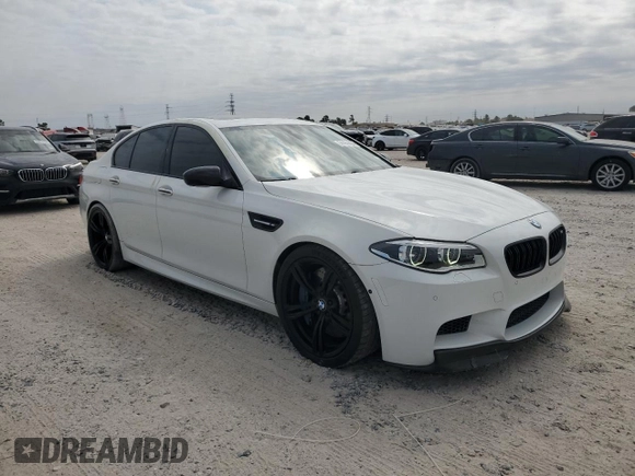 2016 BMW M5 with VIN WBSFV9C59GD595692, listed as a Copart auction lot 74151434 with 55,092 mi miles and Salvage Title. Bid and sale history available at carsss.com. Image 4.