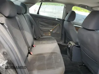 2009 Volkswagen Jetta S z VIN 3VWJM71K39M165677, wystawiony jako Copart lot #56901665 z przebiegiem 202 632 mil mil oraz Czysty tytuł • Clean title. Historia ofert i sprzedaży dostępna na DreamBid. Obrazek 10.