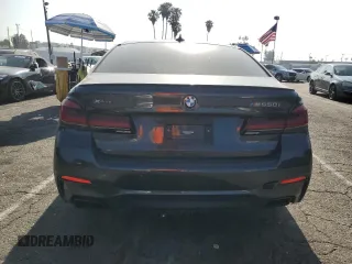 2022 BMW 5 Series M550i xDrive z VIN WBA13BK03NCK95022, wystawiony jako Copart lot #58600105 z przebiegiem 34 142 mil mil oraz Szkoda całkowita • Salvage title. Historia ofert i sprzedaży dostępna na DreamBid. Obrazek 6.