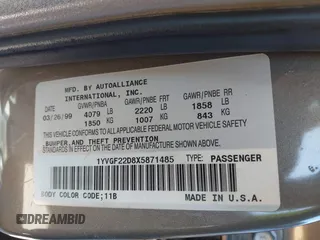 1999 Mazda 626 LX with VIN 1YVGF22D8X5871485, listed as a IAAI auction lot 41641049 with 115,603 mi miles. Bid and sale history available at carsss.com. Image 9.