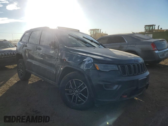 2017 Jeep Grand Cherokee Trailhawk with VIN 1C4RJFLT8HC772429, listed as a Copart auction lot 89334325 with 193,516 mi miles and Salvage title. Bid and sale history available at DreamBid. Image 4.