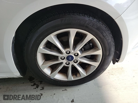2017 Ford Fusion SE z VIN 3FA6P0H76HR151451, wystawiony jako IAAI lot #42787592 z przebiegiem 90 386 mil mil oraz . Historia ofert i sprzedaży dostępna na DreamBid. Obrazek 25.