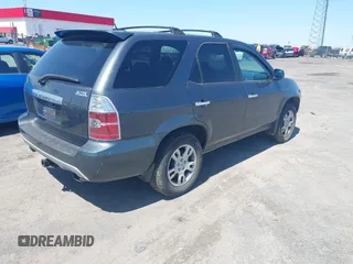 2006 Acura MDX Touring w/Navi with VIN 2HNYD18836H514303, listed as a IAAI auction lot 41972767 with 263,870 mi miles. Bid and sale history available at carsss.com. Image 4.