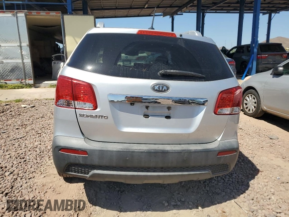 2011 Kia Sorento LX with VIN 5XYKT4A16BG049070, listed as a Copart auction lot 54437955 with 291,459 mi miles and Salvage Title. Bid and sale history available at DreamBid. Image 6.