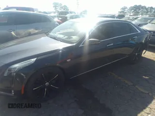 2016 Cadillac CT6 Platinum AWD with VIN 1G6KK5R68GU151651, listed as a IAAI auction lot 41527079 with 89,139 mi miles and . Bid and sale history available at DreamBid. Image 2.