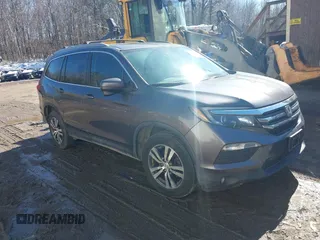 2017 Honda Pilot EX-L z VIN 5FNYF6H63HB027591, wystawiony jako IAAI lot #41854366 z przebiegiem 113 178 mil mil oraz . Historia ofert i sprzedaży dostępna na DreamBid. Obrazek 1.