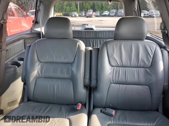 2003 Honda Odyssey EX-L с VIN 2HKRL18033H501741, выставлен на аукционе Copart как лот 60496865 с пробегом Не указан миль и Списание • Salvage title. История ставок и продаж доступна на DreamBid. Изображение 10.