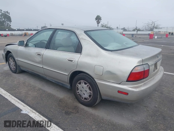 1997 Honda Accord Value with VIN 1HGCD568XVA184006, listed as a IAAI auction lot 41818518 with 276,230 mi miles and . Bid and sale history available at carsss.com. Image 3.