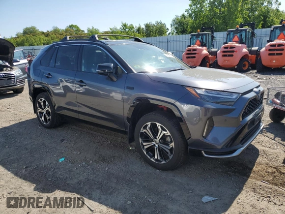 2022 Toyota RAV4 XSE with VIN JTMFB3FV9ND101157, listed as a Copart auction lot 59044315 with 54,591 mi miles and Salvage title. Bid and sale history available at DreamBid. Image 4.