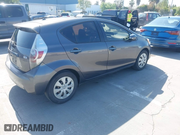 2014 Toyota Prius One with VIN JTDKDTB33E1061088, listed as a IAAI auction lot 42040762 with 206,735 mi miles and . Bid and sale history available at DreamBid. Image 4.