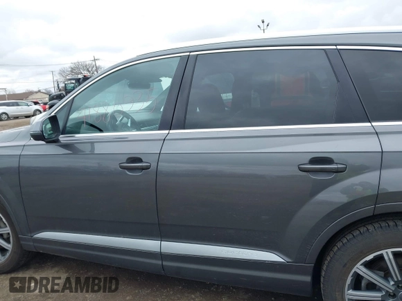 2018 Audi Q7 Premium Plus z VIN WA1LAAF76JD039992, wystawiony jako IAAI lot #41880935 z przebiegiem 74 095 mil mil oraz . Historia ofert i sprzedaży dostępna na DreamBid. Obrazek 14.
