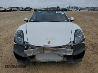 2013 Porsche Boxster с VIN WP0CA2A82DS113808, выставлен на аукционе Copart как лот 86105554 с пробегом 58 526 миль миль и Списание • Salvage title. История ставок и продаж доступна на DreamBid. Изображение 5.