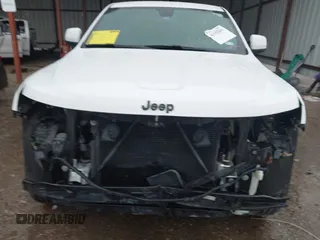 2018 Jeep Grand Cherokee Altitude with VIN 1C4RJFAG4JC320599, listed as a IAAI auction lot 42182661 with 70,957 mi miles and . Bid and sale history available at DreamBid. Image 6.
