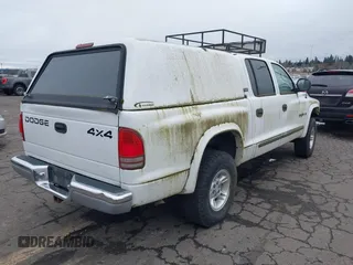 2000 Dodge Dakota Sport with VIN 1B7GG2AN2YS760690, listed as a IAAI auction lot 41616767 with 225,478 mi miles and . Bid and sale history available at carsss.com. Image 4.