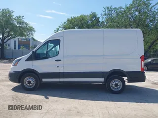 2023 Ford Transit Cargo with VIN 1FTBR2C87PKB38306, listed as a IAAI auction lot 41972454 with 51,049 mi miles and . Bid and sale history available at DreamBid. Image 14.