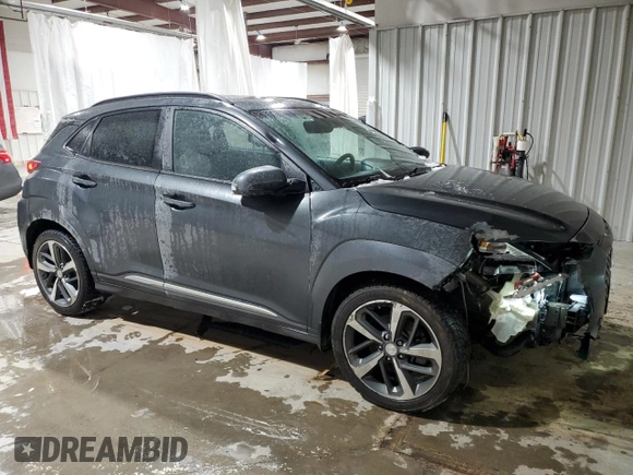 2019 Hyundai Kona Ultimate with VIN KM8K5CA50KU390434, listed as a Copart auction lot 41604145 with 74,743 mi miles and Salvage Title. Bid and sale history available at carsss.com. Image 4.