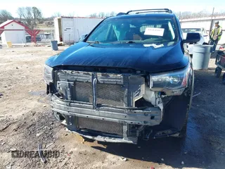 2017 GMC Acadia SLT with VIN 1GKKNVLS2HZ197379, listed as a IAAI auction lot 41684982 with 134,531 mi miles. Bid and sale history available at carsss.com. Image 6.