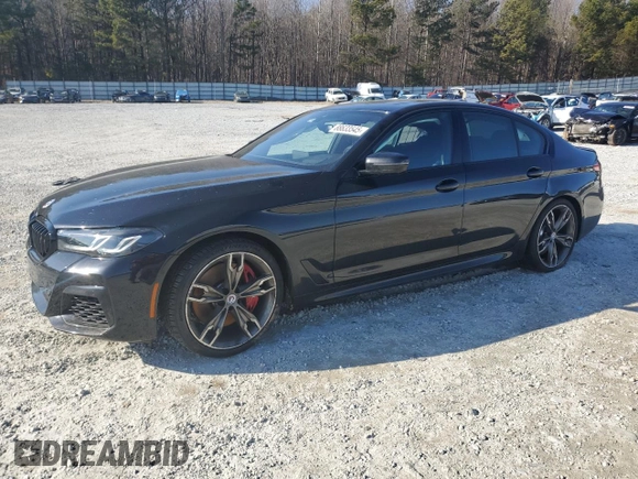 2023 BMW 5 Series M550i xDrive z VIN WBA13BK08PCM88687, wystawiony jako Copart lot #88633545 z przebiegiem Nie podano mil oraz Szkoda całkowita • Salvage title. Historia ofert i sprzedaży dostępna na DreamBid. Obrazek 1.