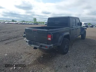 2022 Jeep Gladiator Texas Trail with VIN 1C6HJTAG7NL125006, listed as a IAAI auction lot 42288180 with 96,694 mi miles and . Bid and sale history available at DreamBid. Image 4.