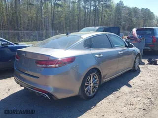 2018 Kia Optima SX with VIN 5XXGV4L26JG187281, listed as a IAAI auction lot 41887939 with 124,782 mi miles. Bid and sale history available at carsss.com. Image 4.