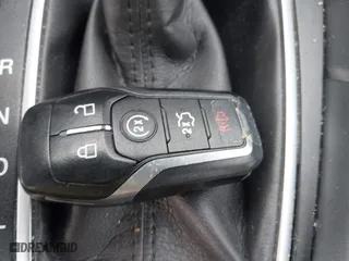 2015 Ford Fusion Titanium Hybrid with VIN 3FA6P0RU6FR299374, listed as a IAAI auction lot 41576007 with 191,285 mi miles. Bid and sale history available at carsss.com. Image 11.