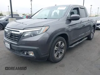 2017 Honda Ridgeline RTL-T with VIN 5FPYK2F67HB002854, listed as a IAAI auction lot 41895895 with 86,882 mi miles and . Bid and sale history available at DreamBid. Image 2.