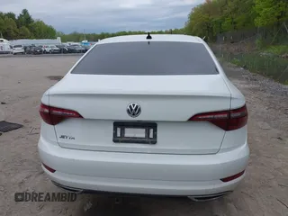 2021 Volkswagen Jetta S z VIN 3VWC57BU6MM020180, wystawiony jako IAAI lot #42263574 z przebiegiem 68 384 mil mil oraz . Historia ofert i sprzedaży dostępna na DreamBid. Obrazek 16.