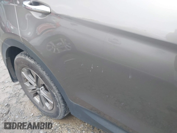 2016 Hyundai Santa Fe z VIN 5XYZU3LB1GG358111, wystawiony jako IAAI lot #42377494 z przebiegiem 92 745 mil mil oraz . Historia ofert i sprzedaży dostępna na DreamBid. Obrazek 6.