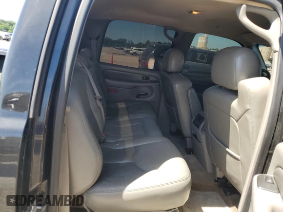 2005 GMC Sierra Denali z VIN 2GTEK63NX51254997, wystawiony jako Copart lot #58178244 z przebiegiem 180 531 mil mil oraz Szkody całkowita. Historia ofert i sprzedaży dostępna na DreamBid. Obrazek 10.