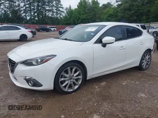 2014 Mazda 3 S Touring with VIN JM1BM1V31E1208377, listed as a IAAI auction lot 42388524 with 122,124 mi miles and . Bid and sale history available at DreamBid. Image 2.