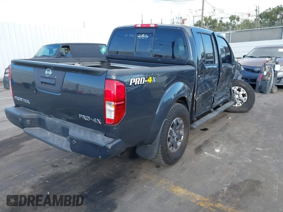 2014 Nissan Frontier SV with VIN 1N6AD0EV5EN737327, listed as a IAAI auction lot 41436164 with 55,866 mi miles and . Bid and sale history available at DreamBid. Image 4.