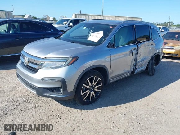 2019 Honda Pilot Elite with VIN 5FNYF6H00KB001016, listed as a IAAI auction lot 42583325 with 133,327 mi miles and . Bid and sale history available at DreamBid. Image 17.