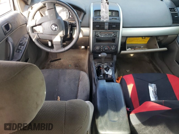 2004 Mitsubishi Galant ES z VIN 4A3AB36F34E141033, wystawiony jako Copart lot #84402814 z przebiegiem 253 403 mil mil oraz Szkoda całkowita • Salvage title. Historia ofert i sprzedaży dostępna na DreamBid. Obrazek 8.