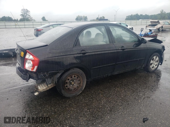 2005 Kia Spectra LX with VIN KNAFE121055134568, listed as a Copart auction lot 71541244 with 146,751 mi miles and Salvage Title. Bid and sale history available at carsss.com. Image 3.