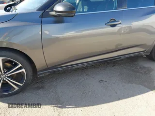 2021 Nissan Sentra SR z VIN 3N1AB8DV0MY290032, wystawiony jako IAAI lot #41819281 z przebiegiem 265 088 mil mil oraz . Historia ofert i sprzedaży dostępna na DreamBid. Obrazek 21.