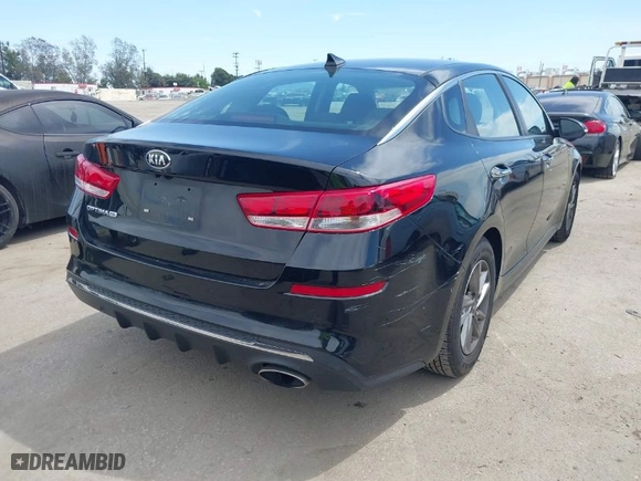 2019 Kia Optima S with VIN 5XXGT4L34KG296953, listed as a IAAI auction lot 42014999 with 64,968 mi miles. Bid and sale history available at carsss.com. Image 4.