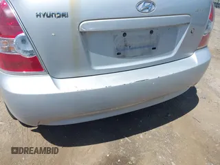 2007 Hyundai Accent SE z VIN KMHCN36C67U007308, wystawiony jako IAAI lot #42312114 z przebiegiem 105 096 mil mil oraz . Historia ofert i sprzedaży dostępna na DreamBid. Obrazek 6.