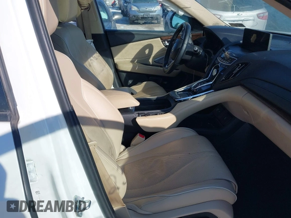 2019 Acura RDX w/Advance Pkg with VIN 5J8TC2H73KL017993, listed as a IAAI auction lot 41282363 with 85,662 mi miles. Bid and sale history available at carsss.com. Image 5.
