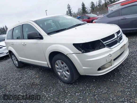 2015 Dodge Journey SE z VIN 3C4PDCAB6FT736330, wystawiony jako IAAI lot #41837047 z przebiegiem 123 567 mil mil oraz . Historia ofert i sprzedaży dostępna na DreamBid. Obrazek 1.